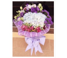 F110 BLUE HYDRANGEAS WITH PURPLE MATCHING FLOWERS IN PURPLE WRAP 